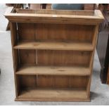 A pine three tier open bookcase. Wall mo