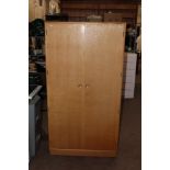 A Merrydew light oak double wardrobe, 17