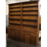 A large modern pine kitchen dresser. 24