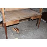 A Vintage oak desk with laminate writing