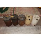 A group of five vintage five gallon oil