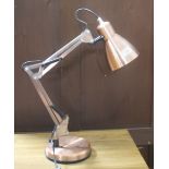 A modern copper effect Anglepoise lamp.