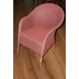 A pink Lloyd loom "Lusty" tub chair, hei