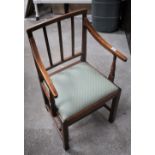 A George III elm armchair, 88 cm with a