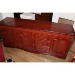 A modern cherry effect sideboard, having