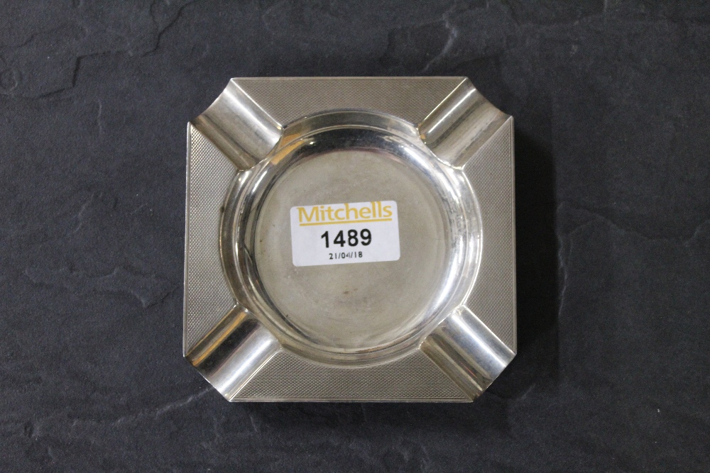 A 1960's silver ashtray with engine turn