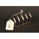 A 1930's four division silver toast rack