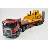 Bruder plastic large scale truck and and low loader with bulldozer. Impressive.