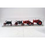 Impressive Ertl Precision 1/16 Farmall / McCormick Vintage Tractor Display. Models contained