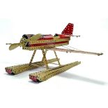 A finely constructed single engine aircraft from Meccano. Finished in red.