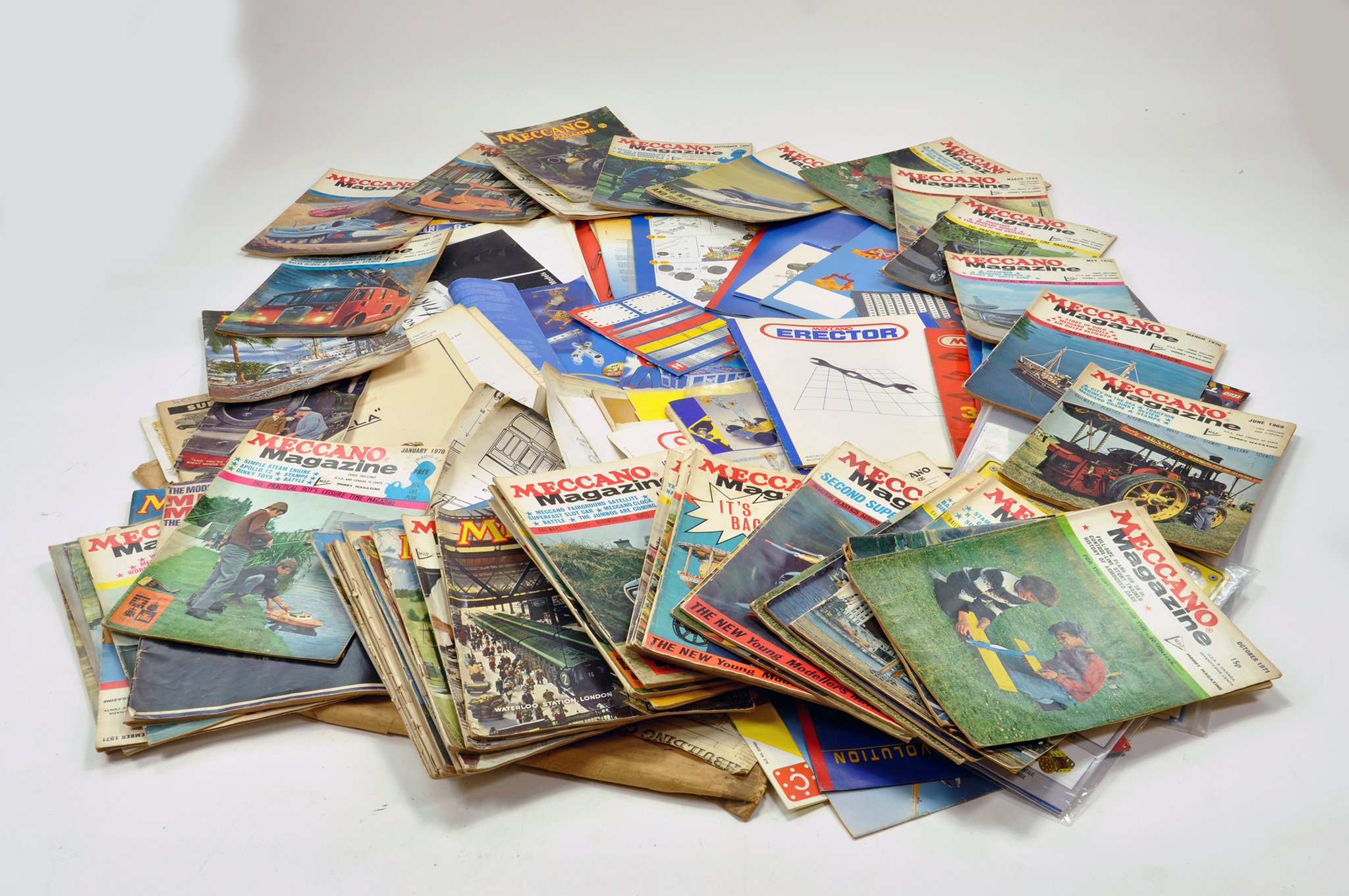 A large quantity of Meccano Magazines, Instruction booklets, plans and other related literature.
