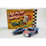 Denys Fisher Stock Car Smash Up comprising 2 vehicles and Throttle Straps. Displays Well.