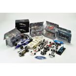 An assortment of diecast comprising mainly racing car issues. Various makers. Some boxed. Fair to