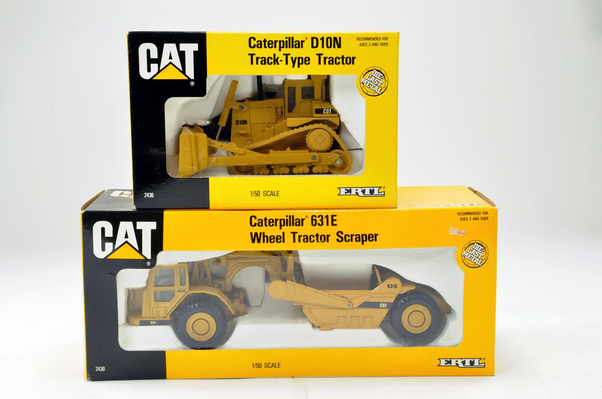 Ertl 1/50 CAT D10N Track Type Tractor plus CAT 631E Wheel Tractor Scraper. E to NM in Boxes.