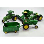 Assorted mainly Ertl 1/16 John Deere Tractor Items. Generally F to G.