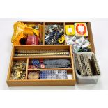 A large quantity of Meccano components, tools, parts and accessories. Various colour combinations in