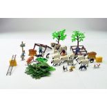 Assorted Farm Animal group and accessories comprising Britains and others. Some metal issues.