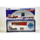 Corgi Diecast Truck Issue comprising No. CC15604 Volvo F89 low loader trailer with load. In the