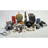 A misc group of items including vintage Camera issues, Watches, Lighters and others.