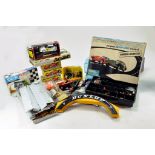A large group of slot car related items comprising Scalextric, Minic and others. Parts,