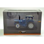 UH 1/32 Ford TW30 Tractor. Looks to be complete, excellent and with original box/boxes.