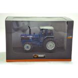 UH 1/32 Ford TW 35 Tractor. Looks to be complete, excellent and with original box/boxes.