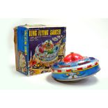 Yoshiya K.O. Toys Japanese Battery Operated Flying Saucer. A bright example with box.