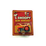 Aviva 1/42 Japan Carded Novelty Snoopy issue Kubota Tractor. Looks to be near mint, likely to have