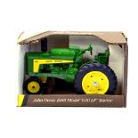 Ertl 1/16 John Deere Model 630 LP Tractor. Looks to be complete, excellent and with original box/