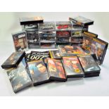 Large James Bond 007 collection of VHS films and diecast cars.