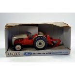 Ertl 1/16 Ford 8N Tractor with Plow. Looks to be complete, excellent and with original box/boxes.