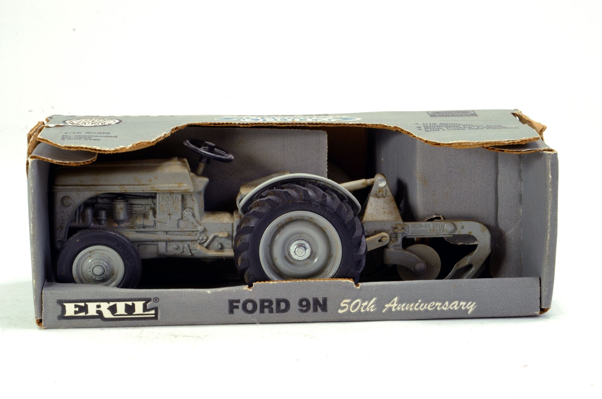 Ertl 1/16 Ford 9N Tractor with Plough. Anniversary Edition. Looks to be complete, no obvious play