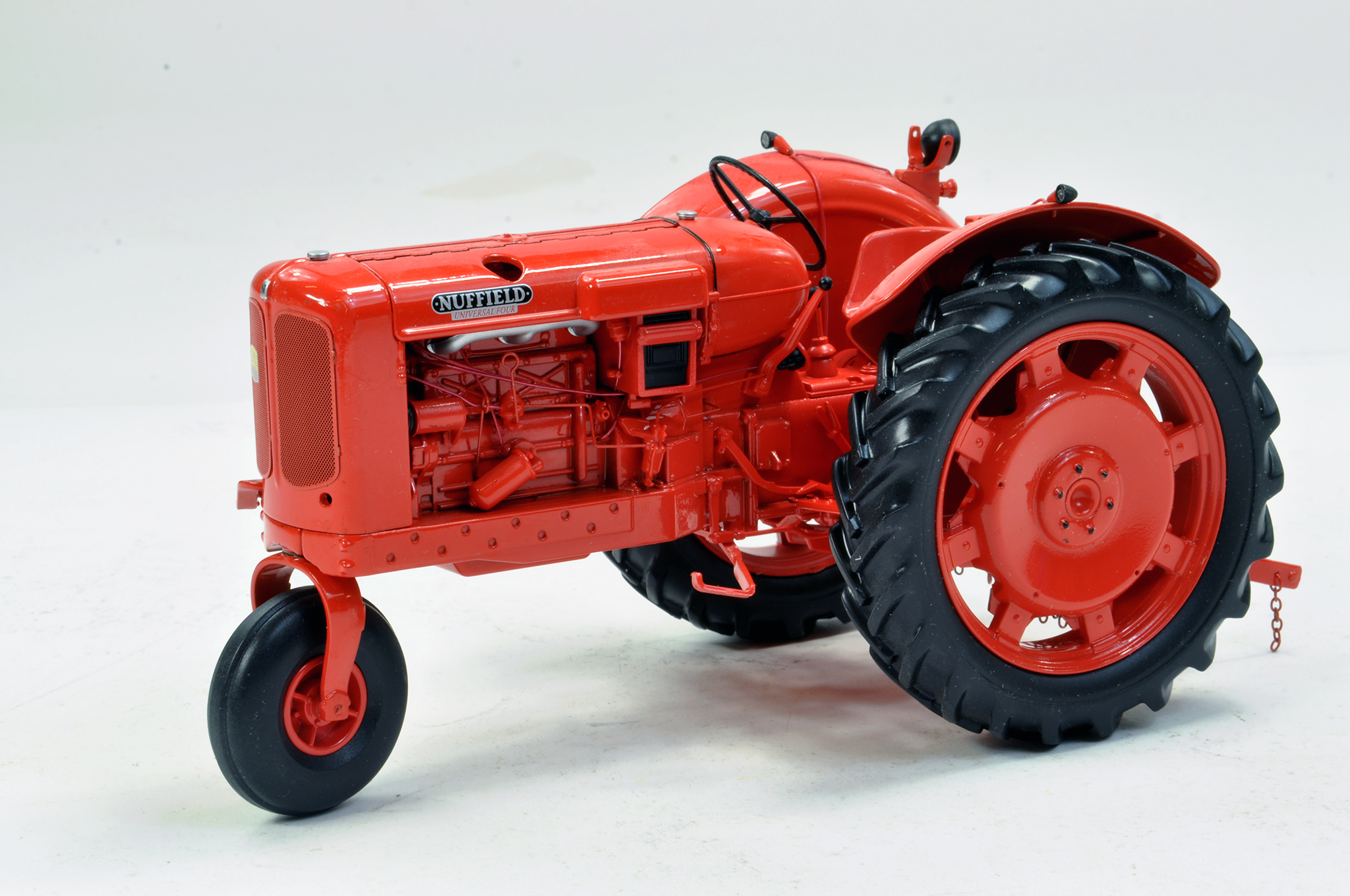 UH 1/16 Nuffield Universal Four Tractor. Tricycle. Missing Exhaust otherwise excellent. No Box.