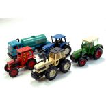 Britains 1/32 Tractor issues including County 1884, Volvo and other issues. Looks to have some signs
