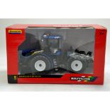 Britains 1/32 New Holland T9.565 Tractor. Looks to be complete, excellent and with original box/