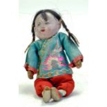 Antique Doll. Chinese, early 1900's composition doll with hand painted features. Embroidered Silk