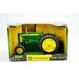 Ertl 1/16 John Deere Model 420-W Tractor. Looks to be complete, excellent and with original box/