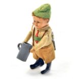 Schuco early issue tinplate German Boy with Jug, mechanical. With Key. Working Condition, displays