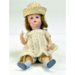Antique Doll. German Bisque Flapper Doll. Marked Germany, 14/0 on back of neck. Refined facial