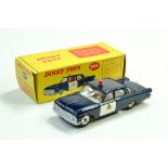 Dinky No. 264 Ford Fairlane RCMP Patrol Car in dark blue with white doors and chrome spun hubs.