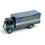 Dinky No. 514 Guy Lyons Swiss Rolls Van in dark blue and mid-blue ridged hubs. Generally good to