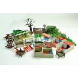 A quantity of Britains Farm accessories comprising trees, huts, milking parlour and others.