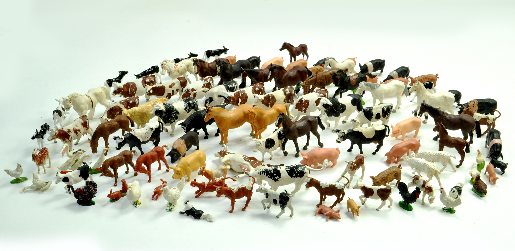 A large group of Britains Farm Animals comprising early Herald issues and others. Some hard to find.