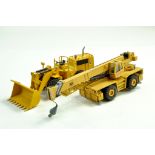 Duo of diecast construction models comprising CAT Wheel loader plus Grove 4 Wheeled Crane. Fair to