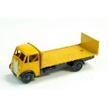 Dinky No. 513 Guy Flat Truck with Tailboard with yellow cab and back, dark blue chassis and ridged