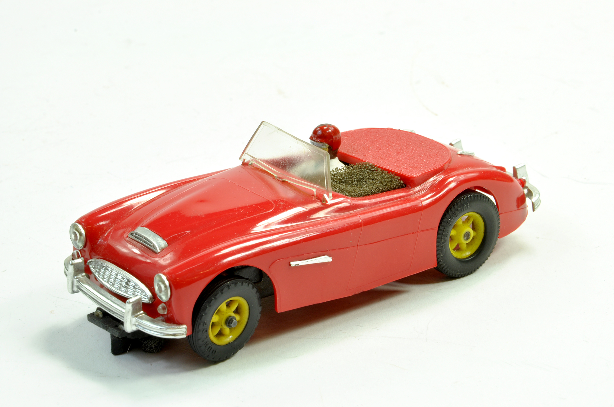 Victory Industries VIP Raceways Slot Car comprising Austin Healey in red with yellow hubs,