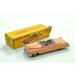 Dinky No. 131 Cadillac Tourer with peach body, grey interior and figure. Generally Fair to Good in