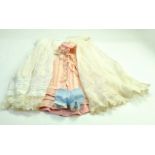 Vintage hand made dolls clothing comprising various garments. Note: We are happy to provide