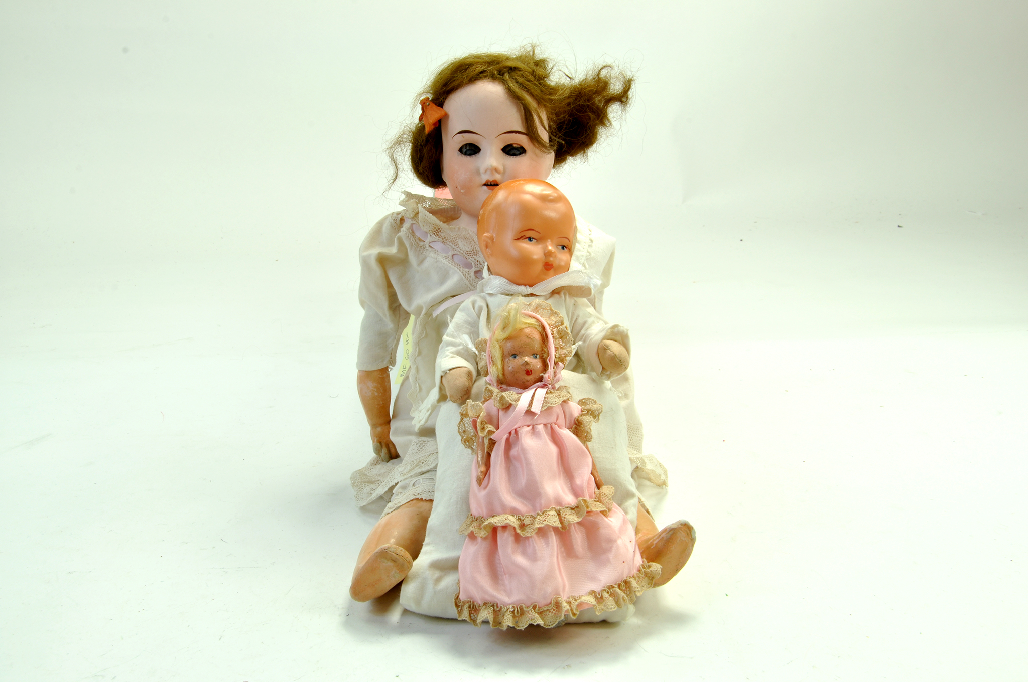 Vintage Doll trio comprising larger early Bisque issue plus others. Conditions only fair. Note: We