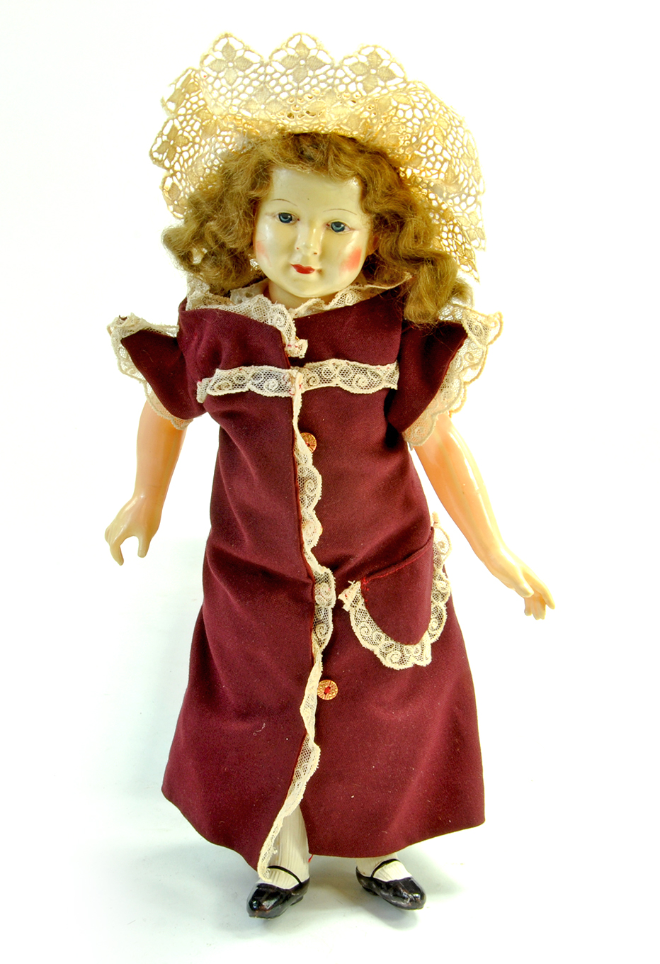 French Petitcollin Celluloid Doll. 13". Marked on the back of her neck, symbol of Eagle wing,